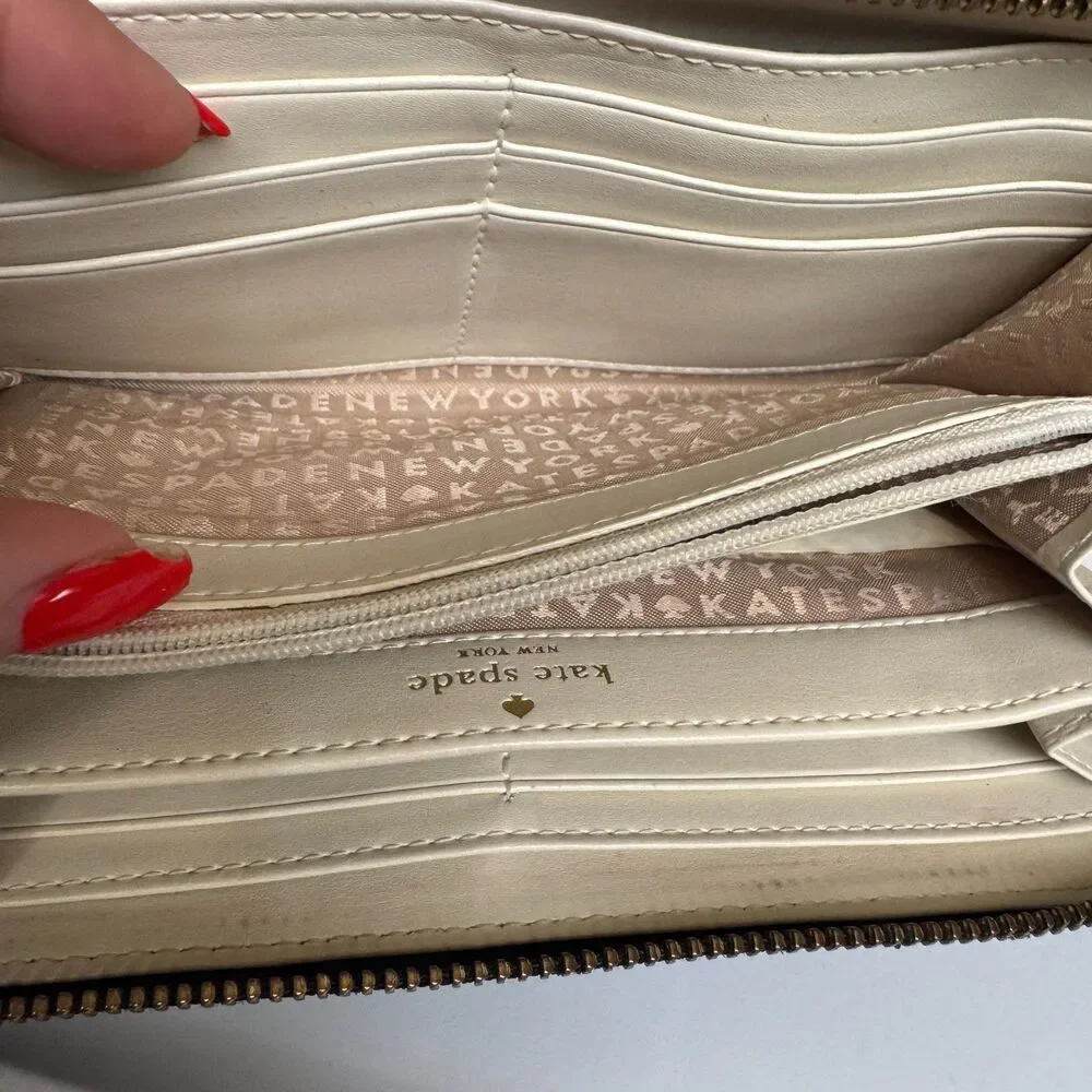 Kate Spade Neda Daycation Zip Around Wallet in Black & Cream Bow Ribbon Pattern